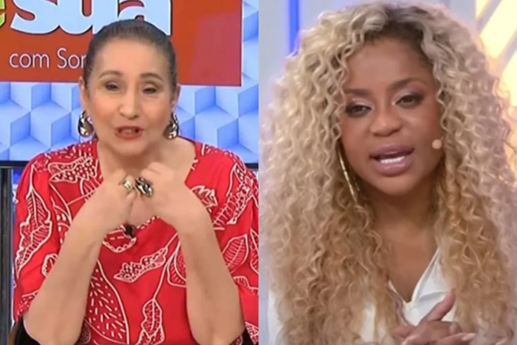 O que aconteceu entre Sonia Abrão e a RedeTV!? Sonia Abrão alfinetou a RedeTV! ao vivo, durante seu programa "A Tarde É Sua", ao comentar sobre pedidos não atendidos pela emissora. Por que Sonia Abrão fez esse comentário? Durante uma entrevista com Cariúcha, Sonia mencionou que seus pedidos estruturais para o programa nunca são atendidos, contrastando com o otimismo da novata. Qual foi a reação de Cariúcha? Cariúcha, ao ouvir o comentário de Sonia, riu e continuou a conversa em tom descontraído, sugerindo que, por ser nova, talvez tenha mais sorte com seus pedidos. O que Cariúcha sugeriu para o SuperPop? Cariúcha propôs aumentar o espaço físico do programa para incluir uma plateia, buscando mais animação nas gravações. Sonia Abrão acredita que Cariúcha terá sucesso com seus pedidos? Sonia, de forma bem-humorada, sugeriu que Cariúcha, por ser nova, talvez consiga realizar seus pedidos, apesar de suas próprias experiências frustradas. Qual foi o tom da conversa entre Sonia e Cariúcha? A conversa manteve um clima descontraído, com risadas e trocas de experiências sobre os bastidores da emissora.