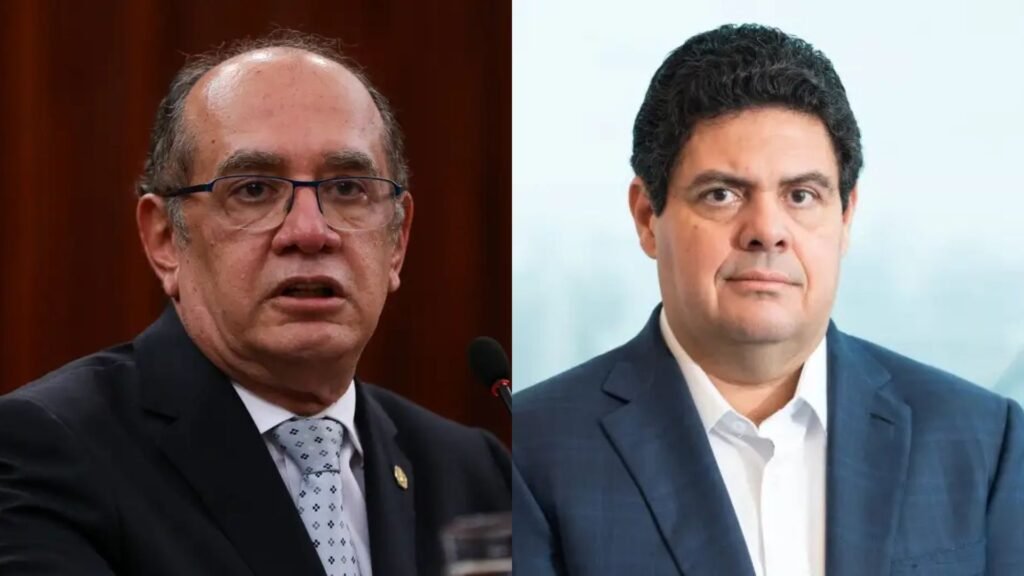 Uma carona de avião acabou puxando um fio que leva a centenas de milhões de reais. Mas por que um voo chamou tanta atenção? Porque ele conectou personagens que, até então, apareciam em frentes diferentes: um ministro do STF, um empresário do agronegócio e um banco que entrou no radar de inteligência financeira. E quando esses nomes passam a dividir o mesmo enredo, a pergunta deixa de ser apenas sobre a viagem. Então o que surgiu de concreto? Um documento de alerta de inteligência financeira apontou que a empresa ligada ao empresário Marcos Molina recebeu R$ 400,9 milhões do Banco Master em apenas oito meses. Isso, por si só, já chama atenção. Só que o ponto mais sensível não está apenas no valor. Está no contexto em que essas operações passaram a ser observadas. Que contexto é esse? O Conselho de Controle de Atividades Financeiras, o Coaf, analisou entradas e saídas da empresa entre julho de 2024 e março de 2025. Nesse intervalo, os repasses feitos pelo banco de Daniel Vorcaro, que foi liquidado em novembro, apareceram entre os mais relevantes dentro dos R$ 38 bilhões que ingressaram na empresa no período. E é aqui que muita gente começa a se surpreender: o alerta não fala só de volume. O que mais aparece nesse documento? Segundo a análise da movimentação global, há menções a “movimentação em benefício de terceiros sem causa aparente”, “transações expressivas em espécie com indícios de fracionamento” e “recebimento de créditos com o imediato débito sem aparente justificativa”. Mas há um detalhe que quase ninguém percebe: os apontamentos são gerais e por amostragem, sem indicação de operações específicas. Se não há operação específica apontada, por que o caso ganhou força? Porque o nome de Molina aparece no documento como um dos donos da Marfrig, gigante do agronegócio criada por ele em 2000. E porque a relação comercial com o Master passou a ser observada justamente depois que outro fato trouxe visibilidade extra ao empresário: a carona dada ao ministro Gilmar Mendes em um avião da Prime You, empresa da qual Vorcaro era sócio. E quando essa ligação veio à tona? A informação sobre a viagem foi revelada pelo jornal O Estado de S. Paulo. A partir daí, a conexão entre os nomes deixou de parecer episódica. O empresário que convidou o ministro para o voo é o mesmo ligado à empresa que recebeu os repasses do banco cujo sócio também estava ligado à aeronave. O que acontece depois muda o peso da história: os números entram em cena. Que números são esses? De acordo com os documentos citados, entre julho e agosto de 2024, o Banco Master repassou R$ 101,6 milhões à empresa. De agosto de 2024 a fevereiro de 2025, foram mais R$ 282,5 milhões. Entre fevereiro e março de 2025, outros R$ 16,7 milhões. Somados, os valores chegam aos R$ 400,9 milhões que colocaram a operação sob atenção. Mas como a empresa respondeu? Por meio da assessoria, a MBRF afirmou que realiza milhares de operações de câmbio com dezenas de instituições financeiras e que o Master foi apenas uma delas. Disse também que não mantinha conta corrente no banco nem realizou investimentos por meio da instituição. Além disso, rejeitou qualquer interpretação diferente sobre as operações de recebimento de exportações. Isso encerra a questão? Não exatamente. Porque a resposta da empresa explica sua versão sobre a natureza das operações, mas não elimina o interesse gerado pelo alerta financeiro nem a curiosidade sobre a dimensão dos repasses. E há outro ponto que reacende a atenção no meio dessa história: a empresa citada já tinha um peso histórico relevante na economia brasileira. Qual? A Marfrig é apontada como uma das chamadas “Campeãs Nacionais”, grupo de empresas associado a uma política implementada nos dois primeiros mandatos de Lula, com apoio estatal principalmente por meio do BNDES. Entre 2007 e 2009, o banco injetou quase R$ 1 bilhão em capital na empresa. Mais tarde, em maio de 2025, a Marfrig se fundiu com a BRF, formando a MBRF, da qual Molina se tornou presidente do Conselho de Administração. E o ministro, o que disse sobre tudo isso? Gilmar Mendes permaneceu em silêncio. Esse silêncio, somado ao alerta, aos repasses e à viagem, é o que mantém a história aberta. No fim, o ponto principal não é apenas que uma empresa ligada a quem deu carona ao ministro recebeu R$ 400,9 milhões do Master. É que essa sequência reuniu, no mesmo quadro, dinheiro, influência, transporte privado e monitoramento financeiro. E quando todos esses elementos aparecem juntos, a última pergunta nunca é a última.