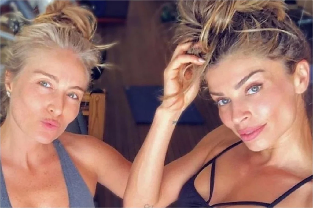 Bastou uma frase solta no meio do treino para transformar um momento comum de academia em assunto nas redes sociais. O que Angélica disse para Grazi Massafera? A resposta veio em tom de brincadeira, mas chamou atenção pela espontaneidade e pelo contexto de descontração entre as duas. Como tudo aconteceu? Angélica e Grazi compartilharam registros de um treino conjunto em uma academia, e as imagens rapidamente repercutiram. Em meio à rotina de exercícios, a apresentadora comentou sobre o condicionamento físico da amiga e fez graça com a boa forma da atriz. O clima era leve, marcado por sintonia e bom humor durante uma atividade puxada. Mas por que a fala ganhou tanta repercussão? Porque o comentário surgiu de forma direta, em um momento descontraído, e arrancou risadas de Grazi. Sem cerimônia, Angélica brincou ao chamar a atriz de **“Arminda safada”**. A frase fez referência à personagem vivida por Grazi e acabou se destacando entre os registros do encontro. Quem é Arminda nessa história? Trata-se da vilã interpretada por Grazi Massafera na novela **Três Graças**. A menção feita por Angélica conecta o momento da academia ao atual momento profissional da atriz, que vive uma fase de grande visibilidade na televisão brasileira. Assim, a brincadeira não ficou solta: ela dialoga com o papel que vem colocando Grazi em evidência. E como Grazi tem vivido essa fase? Em entrevista recente ao portal **LeoDias**, a atriz celebrou a indicação ao prêmio **Melhores do Ano** por sua atuação na novela. O que ela disse sobre isso? Grazi afirmou estar muito entusiasmada por concorrer ao lado de profissionais que admira. Também ressaltou que o reconhecimento do público e da crítica torna o dia muito especial. Esse destaque profissional tem relação com sua rotina? Tem, e de forma intensa. Grazi revelou que a dedicação ao papel exige uma agenda rigorosa ao longo de toda a semana. Como funciona essa rotina? Segundo a atriz, ela grava de **segunda a sábado** e deixa os **domingos** reservados para estudar capítulos e decorar cenas da trama. O ritmo ajuda a explicar o preparo físico exibido no treino e também o elogio bem-humorado feito por Angélica. E o que Grazi diz sobre a própria trajetória? Ao olhar para o caminho percorrido desde sua participação no **Big Brother Brasil**, a atriz refletiu sobre as mudanças que viveu ao longo dos anos. Ela afirmou que se sente como outra pessoa atualmente, embora acredite que sua essência permaneça intacta. Essa percepção acompanha uma busca constante por evolução, tanto na vida pessoal quanto na carreira. Como ela lida com esse processo? Grazi destacou que faz **terapia** e procura evoluir continuamente. Há espaço para leveza em meio a tanta cobrança? Segundo a própria atriz, sim. Ela disse que consegue se divertir até com os erros, sem perder o foco em batalhar por seus sonhos e objetivos. Então, o que começou como um simples registro de treino acabou reunindo amizade, humor e um retrato do momento atual de Grazi Massafera. De um lado, Angélica observando a disposição da amiga e reagindo com espontaneidade. Do outro, uma atriz mergulhada em uma rotina intensa, colhendo reconhecimento por seu trabalho e mantendo disciplina dentro e fora dos estúdios. E foi nesse encontro entre esforço e descontração que surgiu a frase que mais repercutiu: **“Arminda safada”**.